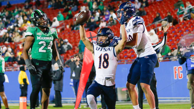 UTSA Roadrunners wide receiver David Amador (18) scores a touchdown during the third quarter against the Marshall Thundering Herd at Toyota Stadium. 